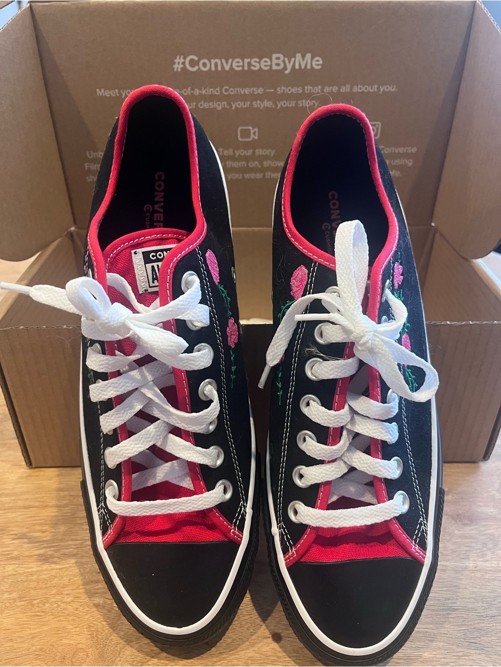 Converse Black Low-Top Sneakers with Pink Trim and White Laces